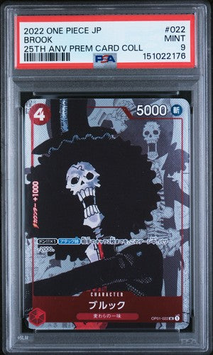 Carta gradata Brook 022 One Piece 25th Anniversary PSA 9 in slab protettiva
